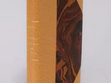 a close up of a book on a white surface with a white background