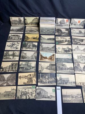 many old postcards of different types and sizes on a table