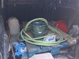 an image of a truck with a lot of stuff in the back
