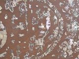 a close up of a wooden table with a pattern on it