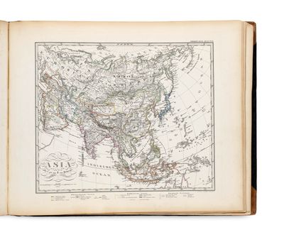 an old book with a map of asia on it