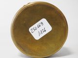 an image of a gold plate with a label on it