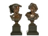 une paire de bustes en bronze représentant une femme et un homme