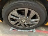 a close up of a tire on a car