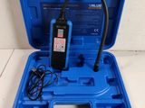 an open blue tool box with a cord in it on a white surface