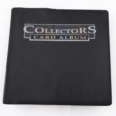 a black album with a silver logo on it