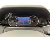 the dashboard of a car with a digital display in the center