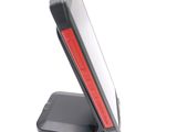 a cell phone that is sitting on top of a stand