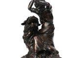 bronze statue of a woman and a dog on a white background