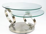 a glass table with two rings on top of it