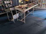 a long table with many items on it in a store