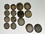 a lot of coins that are sitting on a table