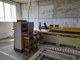 an image of a factory with a refrigerator and a machine