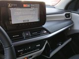 a picture of a car dashboard with a tablet on it