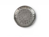 a silver plate with a circular design on it