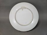 a white plate with a rope on it
