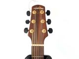 the headstock of a guitar with the headstock of a guitar in the foreground