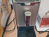 a coffee machine that is sitting on a table