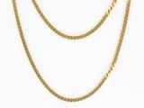 un collier à chaîne en or avec un fermoir en or