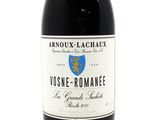a bottle of wine that is sitting on a table