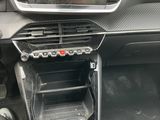 a picture of a car dashboard with a digital display