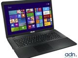 the asus laptop is open and ready to be used
