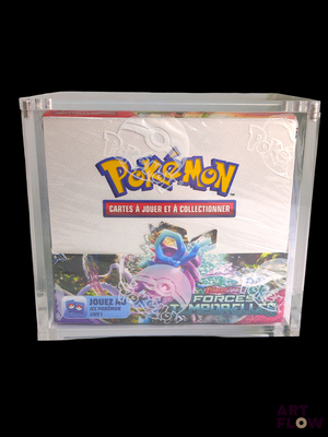 a box of pokemon trading cards on a black background