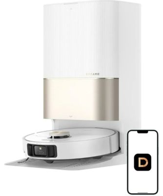 une photo d'un « roombake » blanc et doré, avec un téléphone à côté