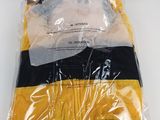 the yellow and black striped shirt is wrapped in plastic