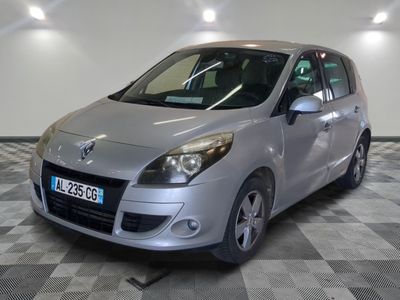 a picture of a silver car parked in a garage