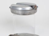 pair of silver plated containers with lids on white surface