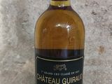 a bottle of wine that is sitting on a table