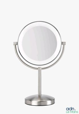 a close up of a mirror on a stand on a white background