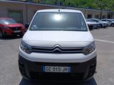 a white van that is parked in a parking lot
