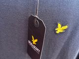 a picture of a t - shirt with a yellow butterfly on it