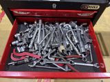 a red tool box full of wrens and other tools