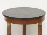 an image of a round table with a marble top