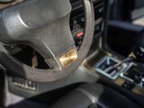 a close up of a steering wheel and dashboard of a car