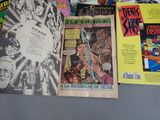 a lot of comic books on the table