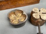 three wooden boxes with flowers on them on a table
