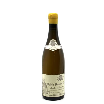 a bottle of wine that is sitting on a table