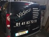 a van that is parked inside of a building