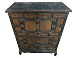 an image of a wooden chest of drawers with a tile top