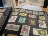 a book with stamps on it sitting on a table