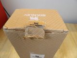 a box that is sitting on a wooden table