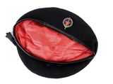 a black hat with a red lining and a star on it
