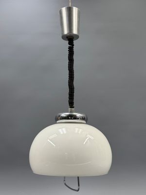 an image of a white light hanging from a ceiling