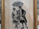a picture of a man and a woman holding an umbrella