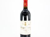 a bottle of wine that is sitting on a table