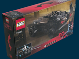 lego batman batmobile set in a box on a blue background